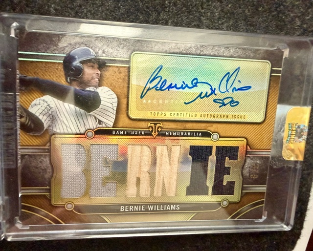 Bernie Williams signed card with a autograph detail that looks like a small inscription or symbol